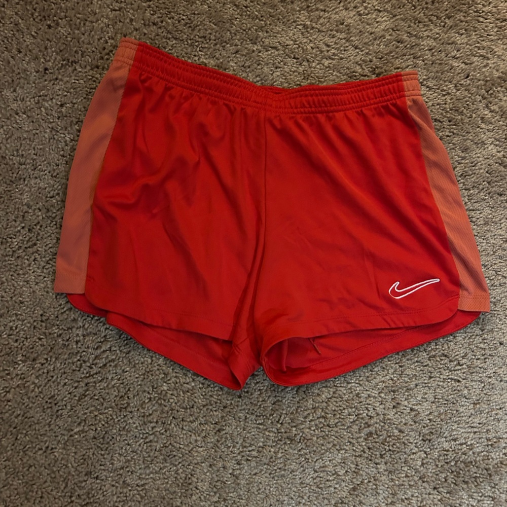 Nike Women’s Red Athletic Shorts with Coral Side Panels